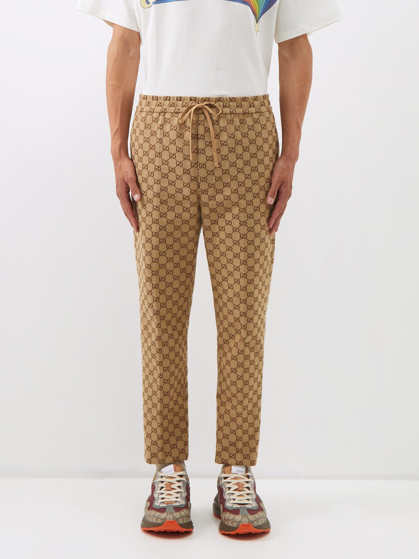 Neutral GG-jacquard cotton-blend trousers | Gucci | MATCHESFASHION US