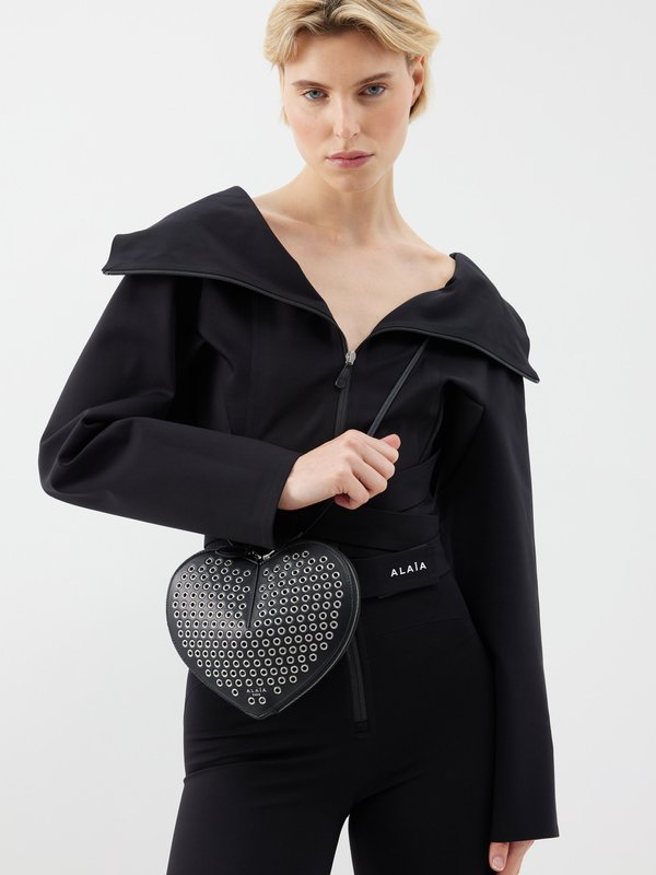 ALAÏA Le Cœur eyelet-embellished leather cross-body bag