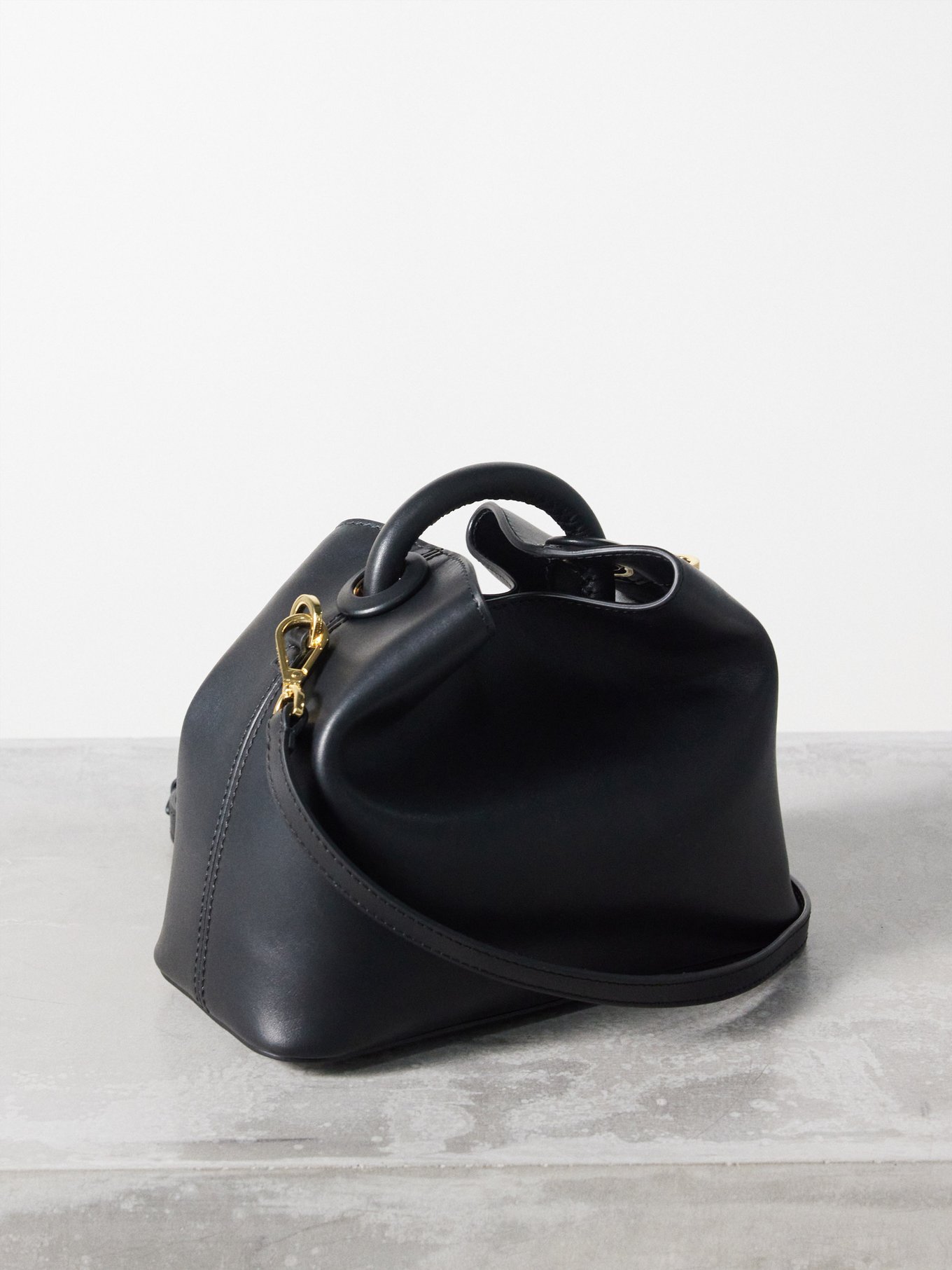 Black Baozi top handle leather crossbody bag