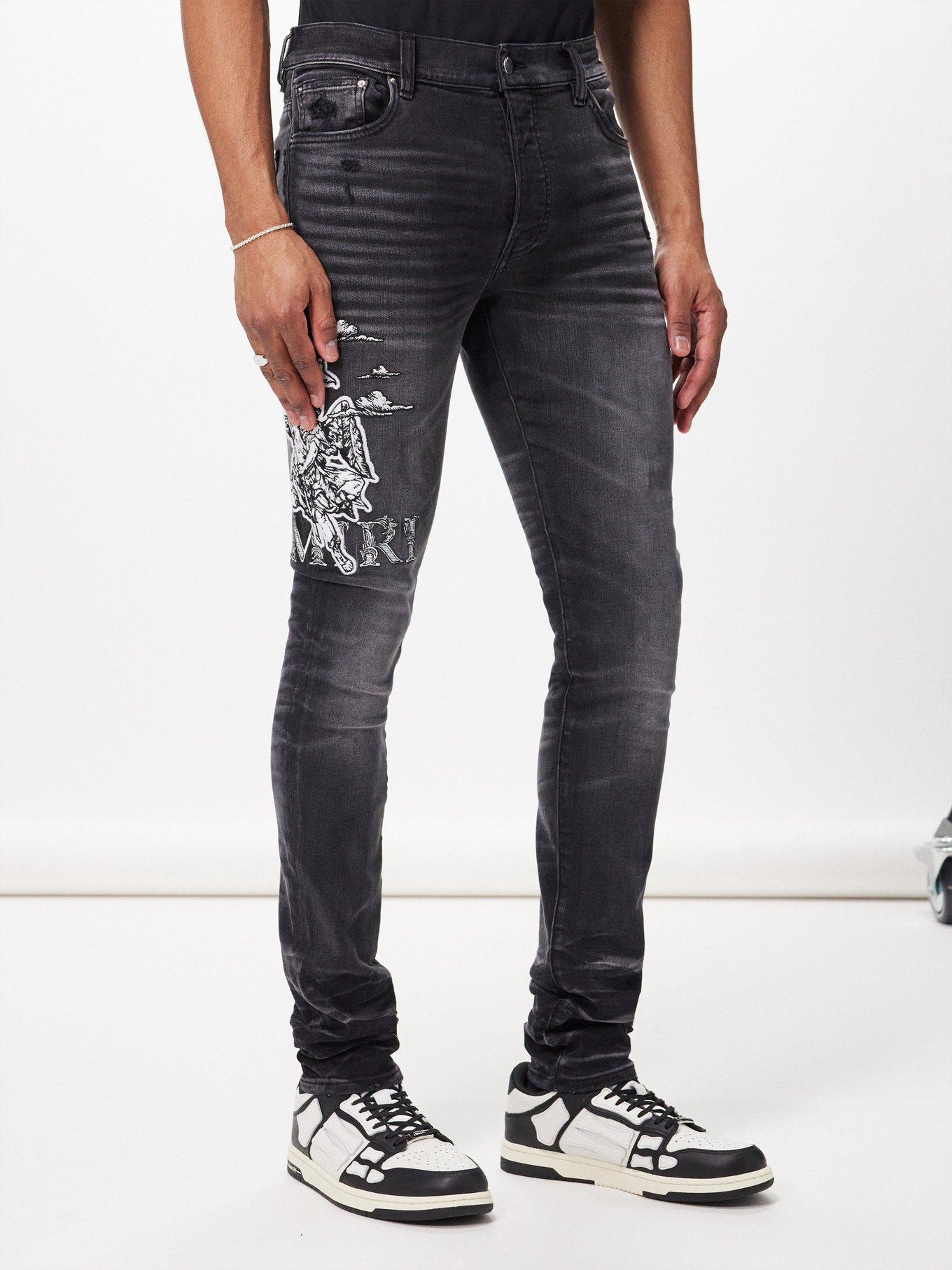 Angel-patch slim-leg jeans | Amiri