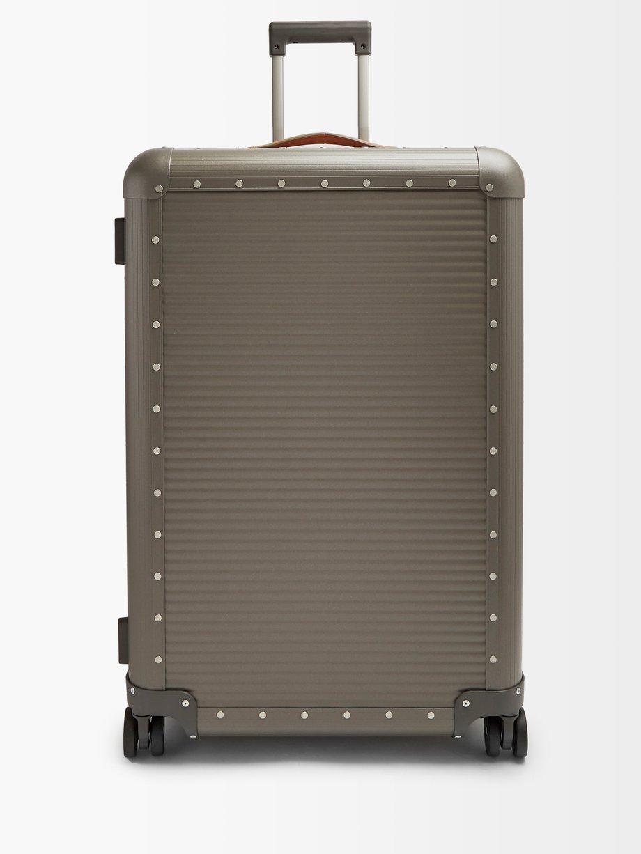 FPM Milano Spinner 76 stud-embellished suitcase