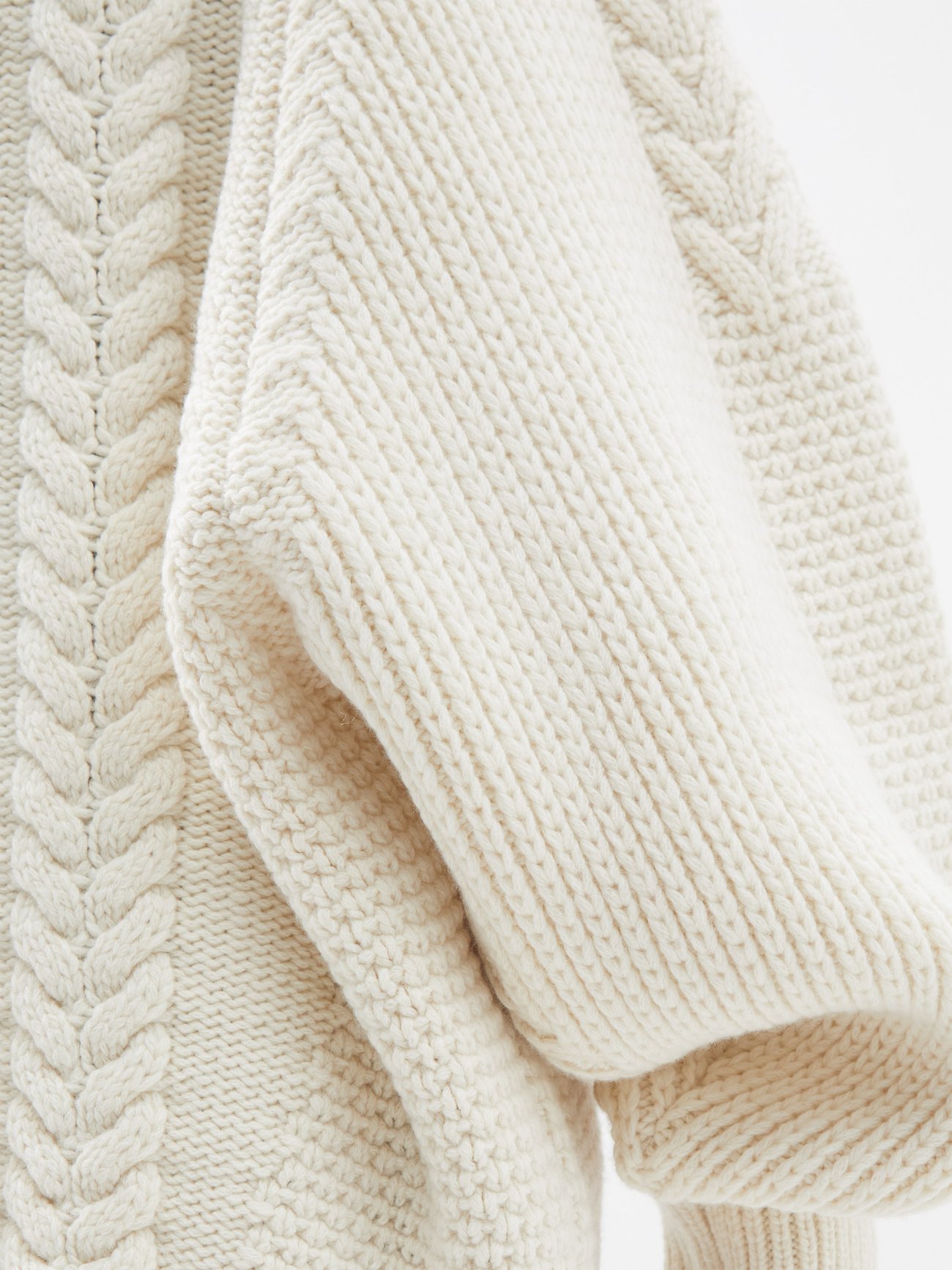 Neutral Oversized contrast-panel wool-blend sweater