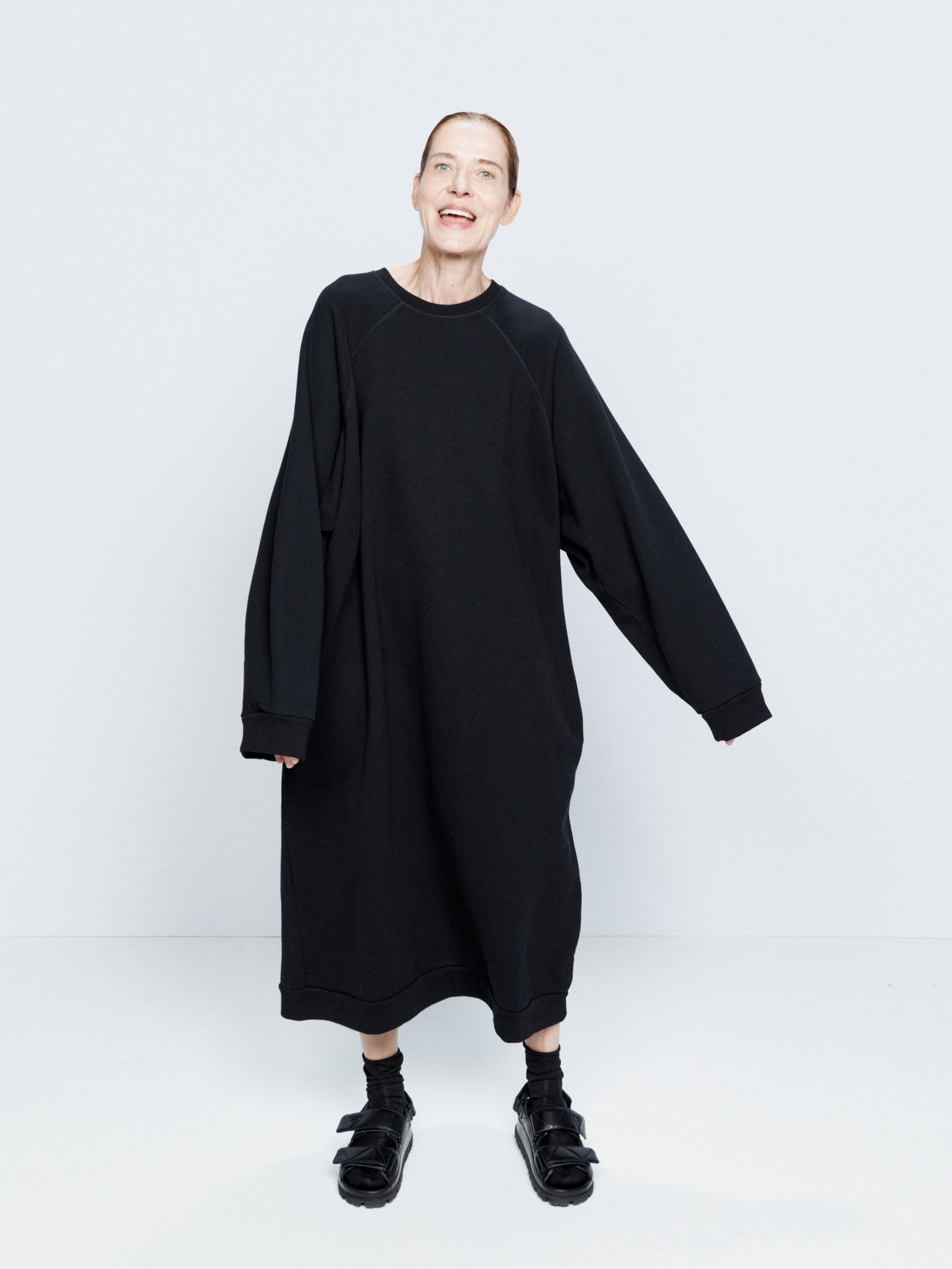 Raey’s black sweatshirt dress will impart a contemporary mood to your off-duty edits through its oversized construction. It’s made from a recycled-cotton blend then finished with a ribbed crew neckline, raglan sleeves and side-slip pockets.