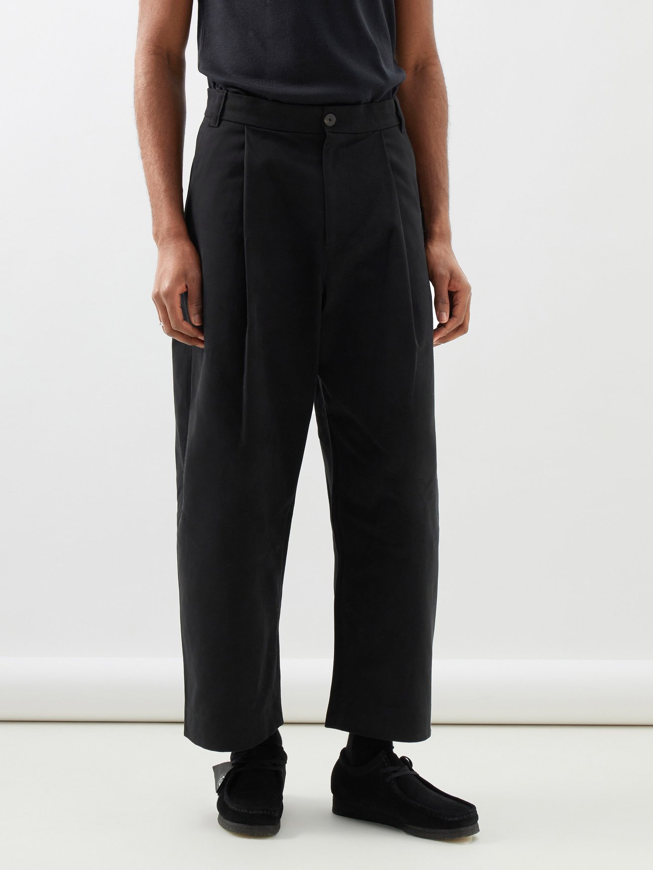 Black Sorte pleated cotton-twill wide-leg trousers | Studio Nicholson ...