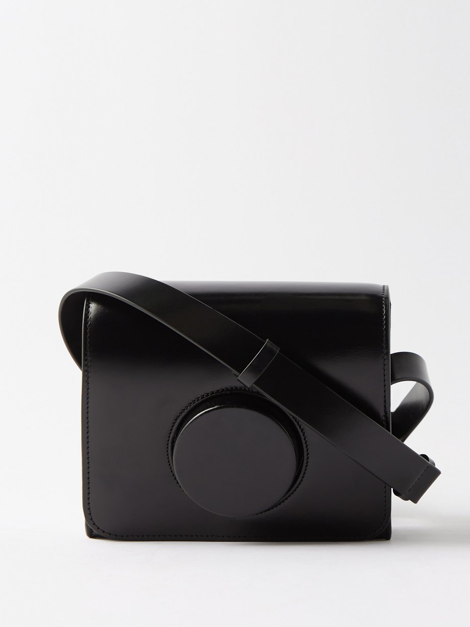 Black Camera small leather cross-body bag | Lemaire | MATCHES UK