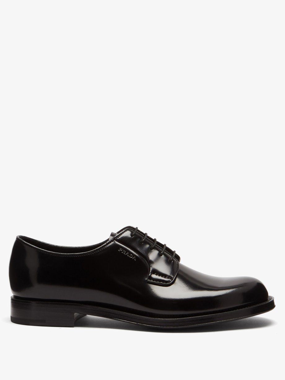 Black Spazzolato-leather Derby shoes | Prada | MATCHES UK