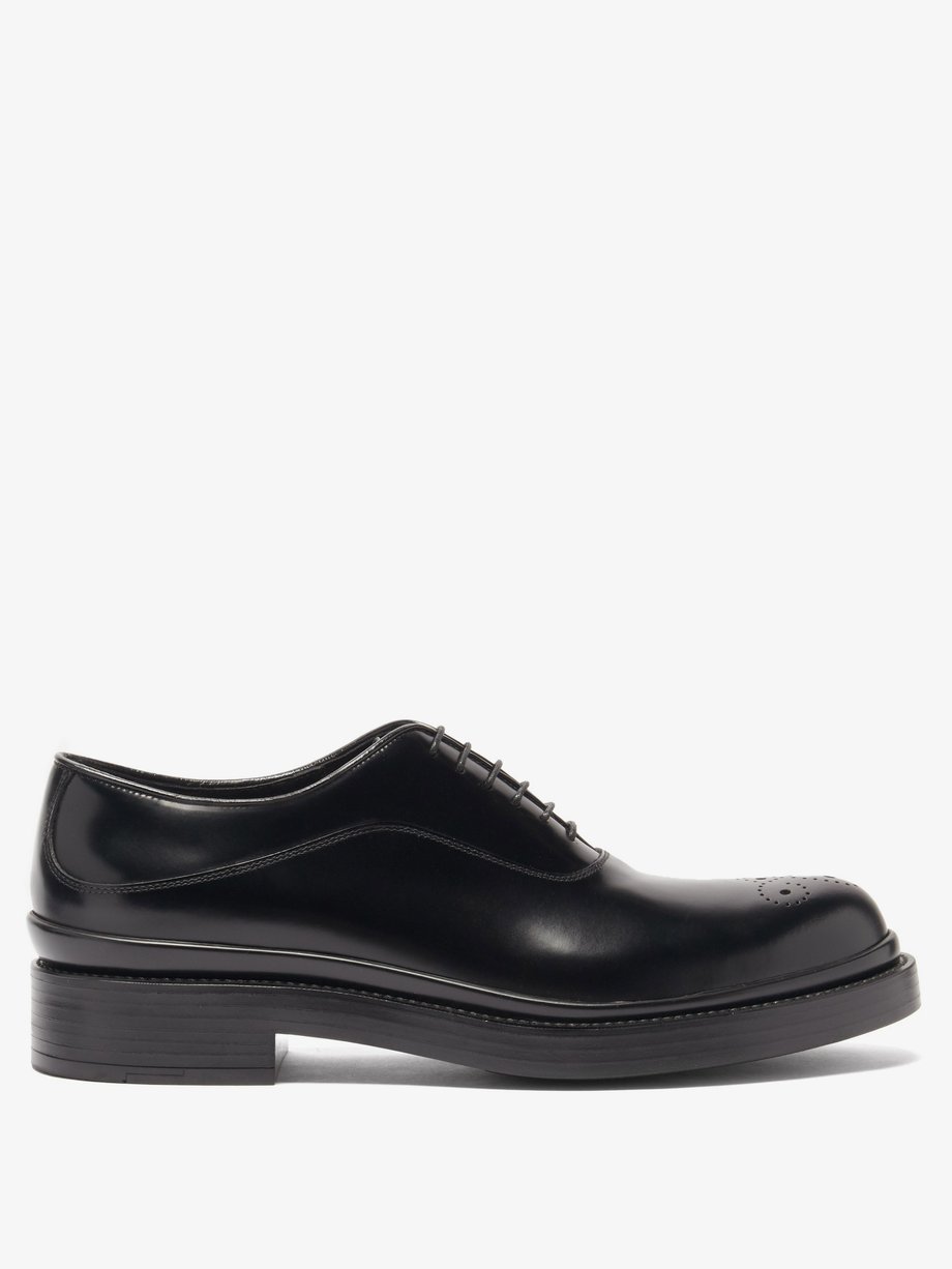 Black Spazzolato-leather Oxford shoes | Prada | MATCHES UK
