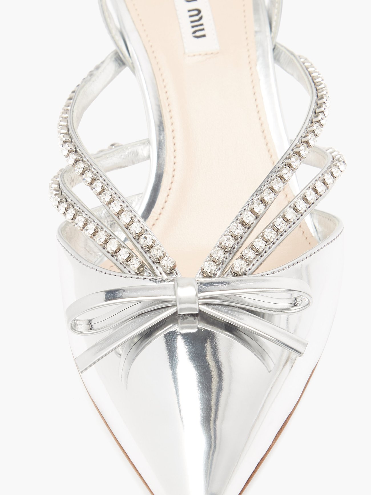 Click here to buy Miu Miu Bow-embellished glitter pumps at  MATCHESFASHION.COM