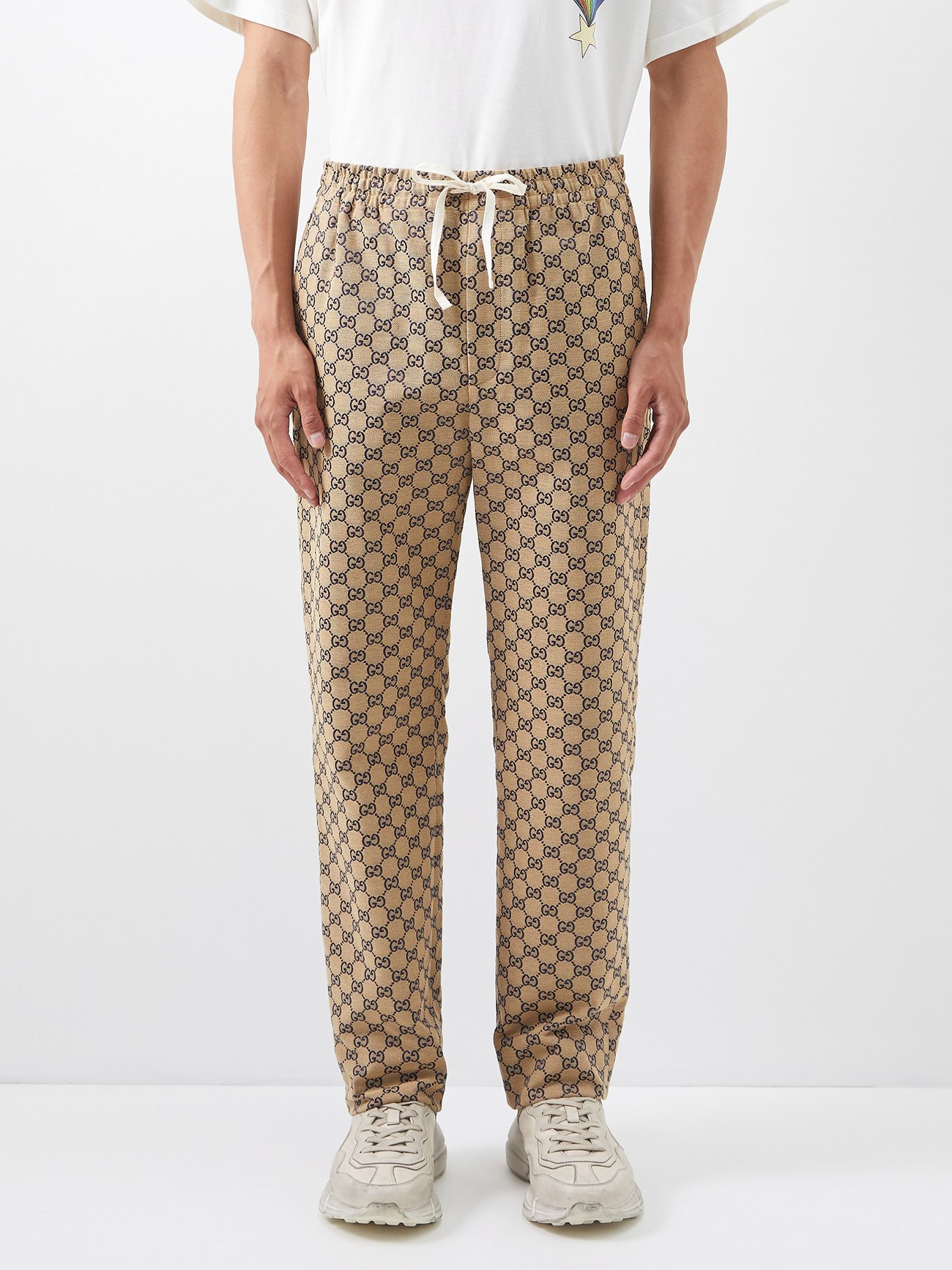 Brown GG-jacquard cotton-blend canvas track pants | Gucci | MATCHESFASHION  UK