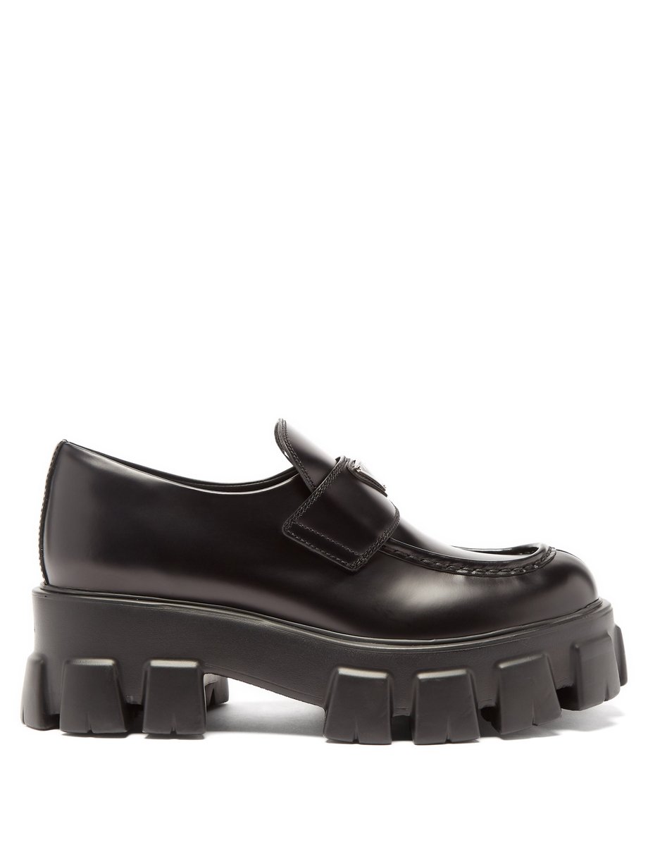Black Triangle-plaque tread-sole leather loafers | Prada ...