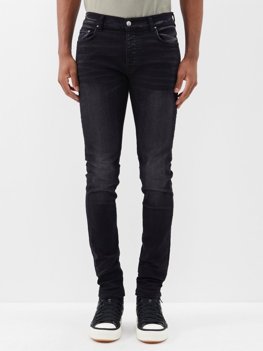 Black Stack skinny-leg jeans | Amiri | MATCHES UK