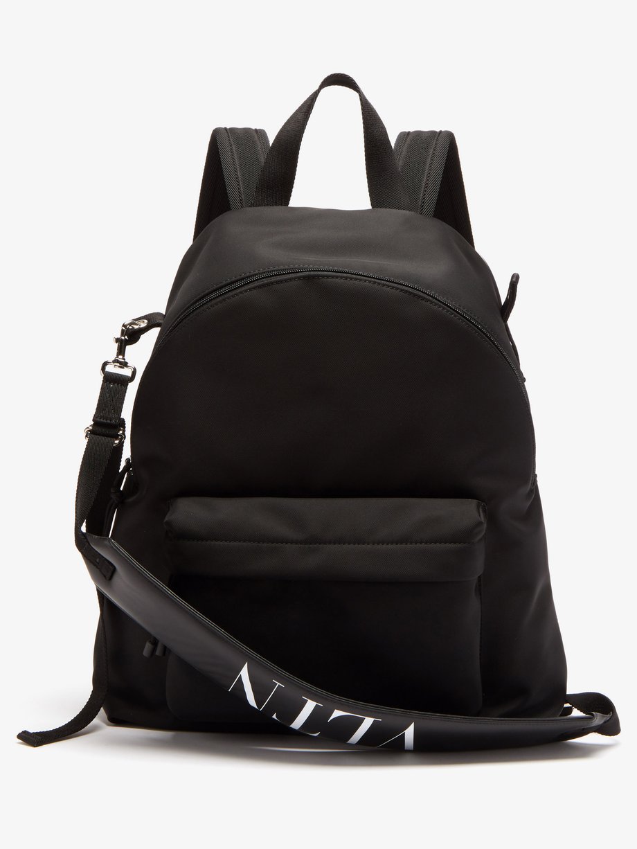 Black VLTN-logo canvas backpack | Valentino Garavani | MATCHESFASHION US