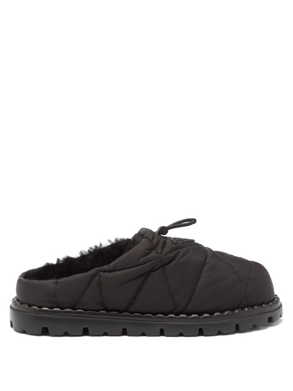Prada Quilted nylon and shearling backless loafers