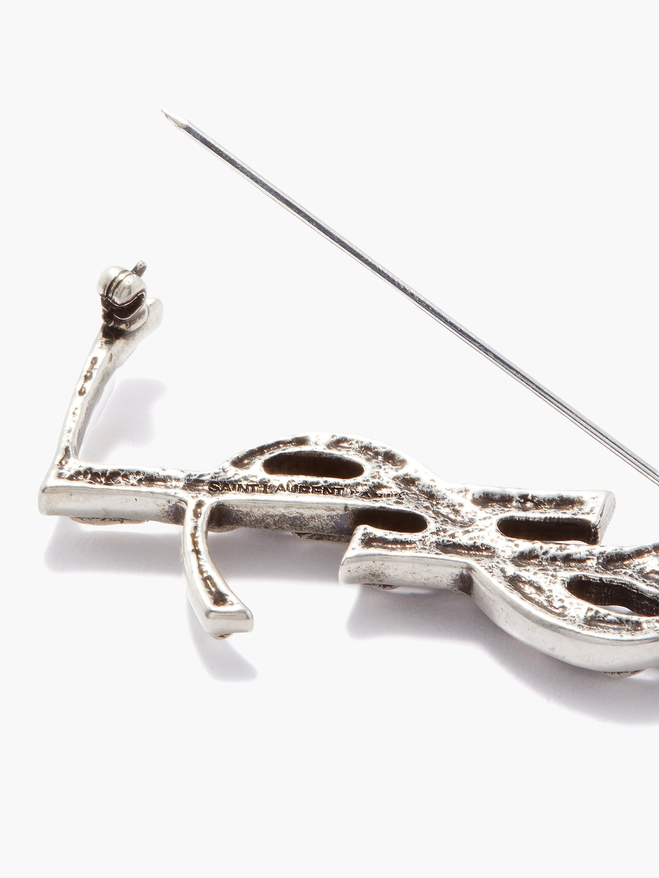 CASSANDRE snake brooch in metal, Saint Laurent