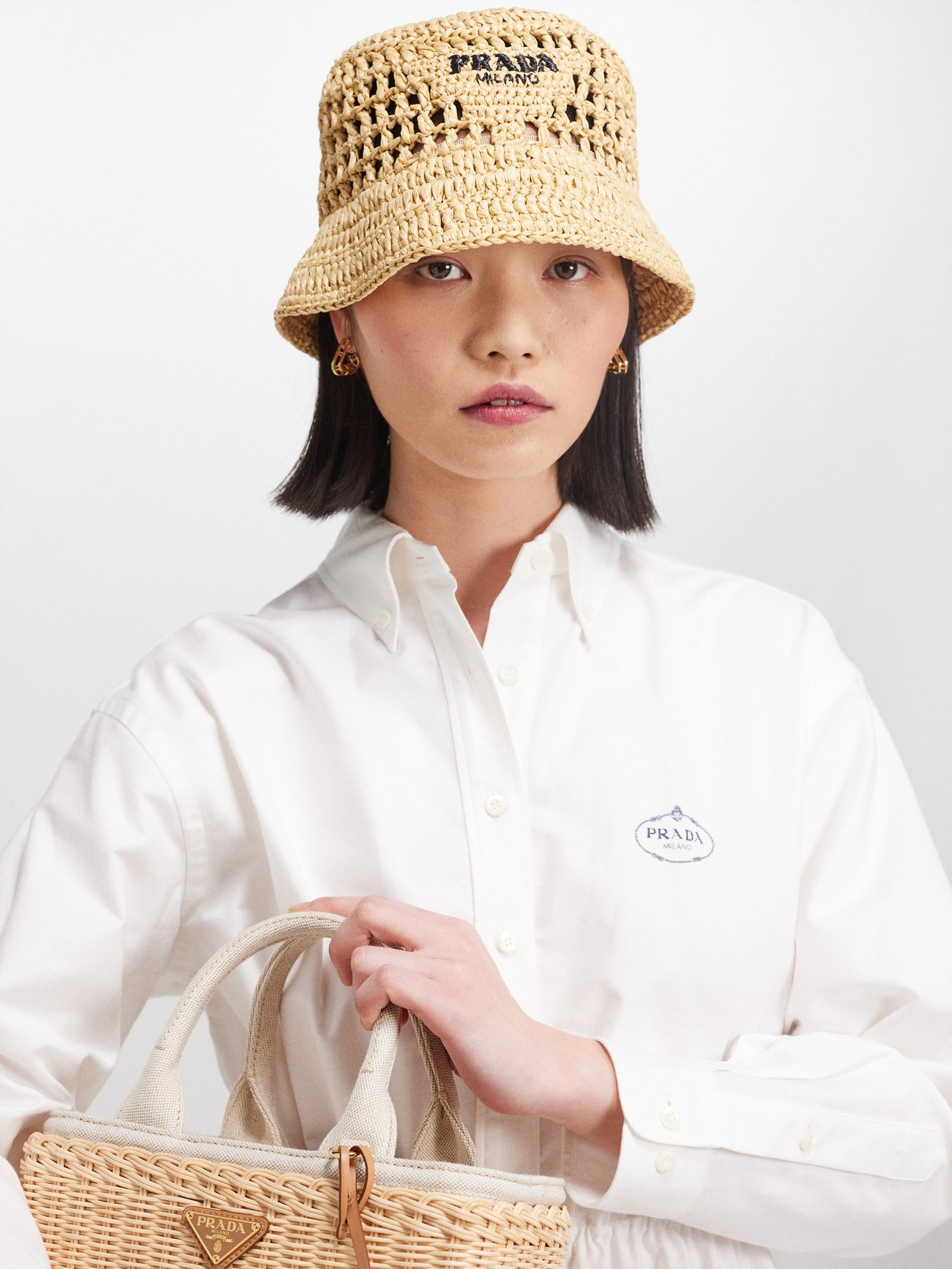 Neutral Logo-embroidered faux-raffia bucket hat