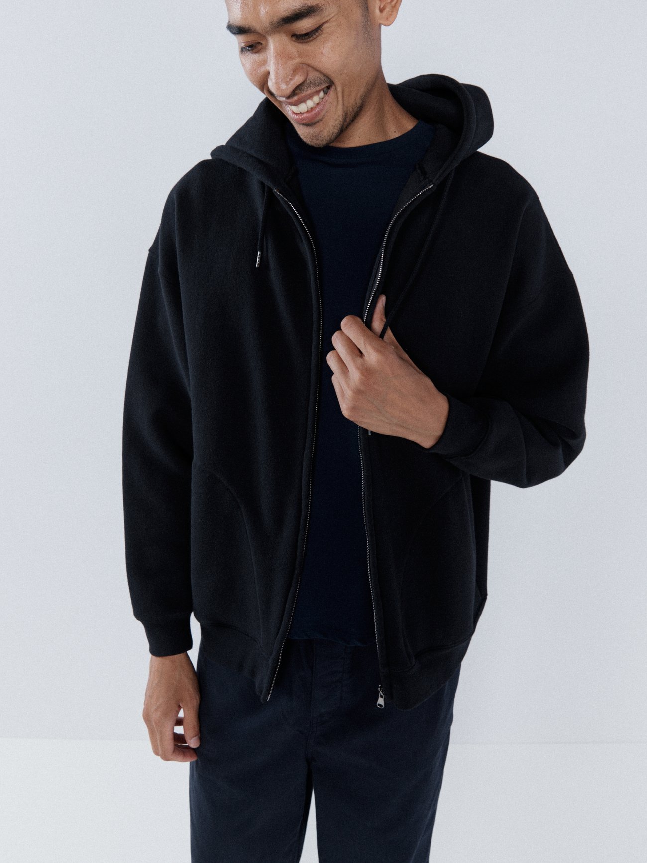 Black Recycled cotton-blend oversized zip through hoodie | Raey ...