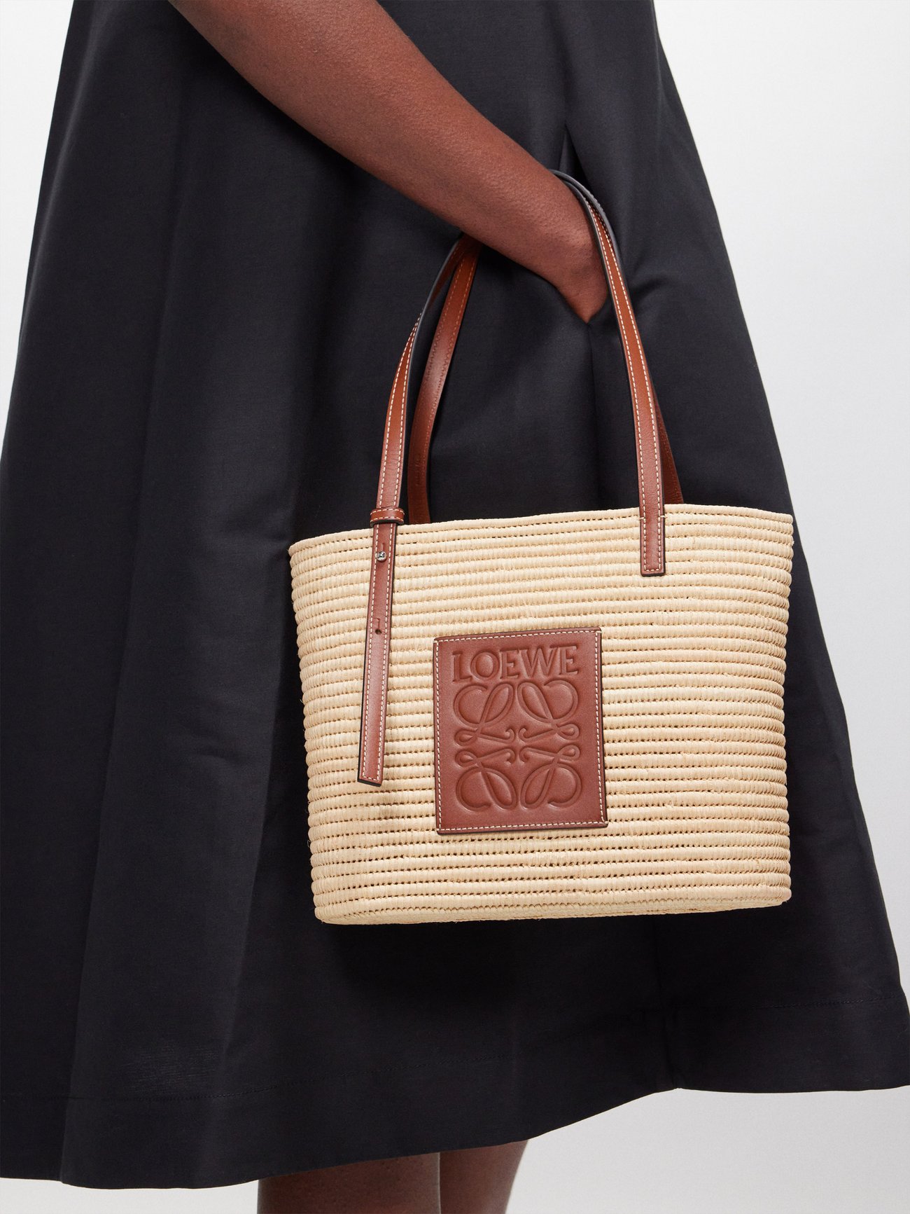 Beige Anagram leather-trimmed raffia basket bag