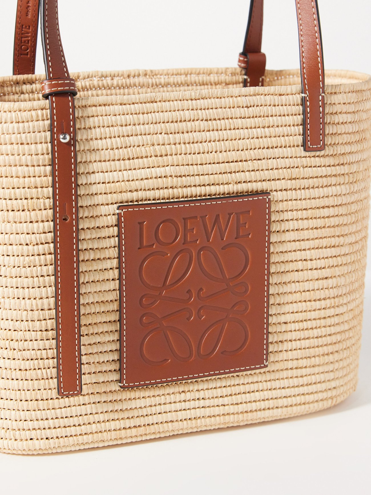 Beige Anagram leather-trimmed raffia basket bag