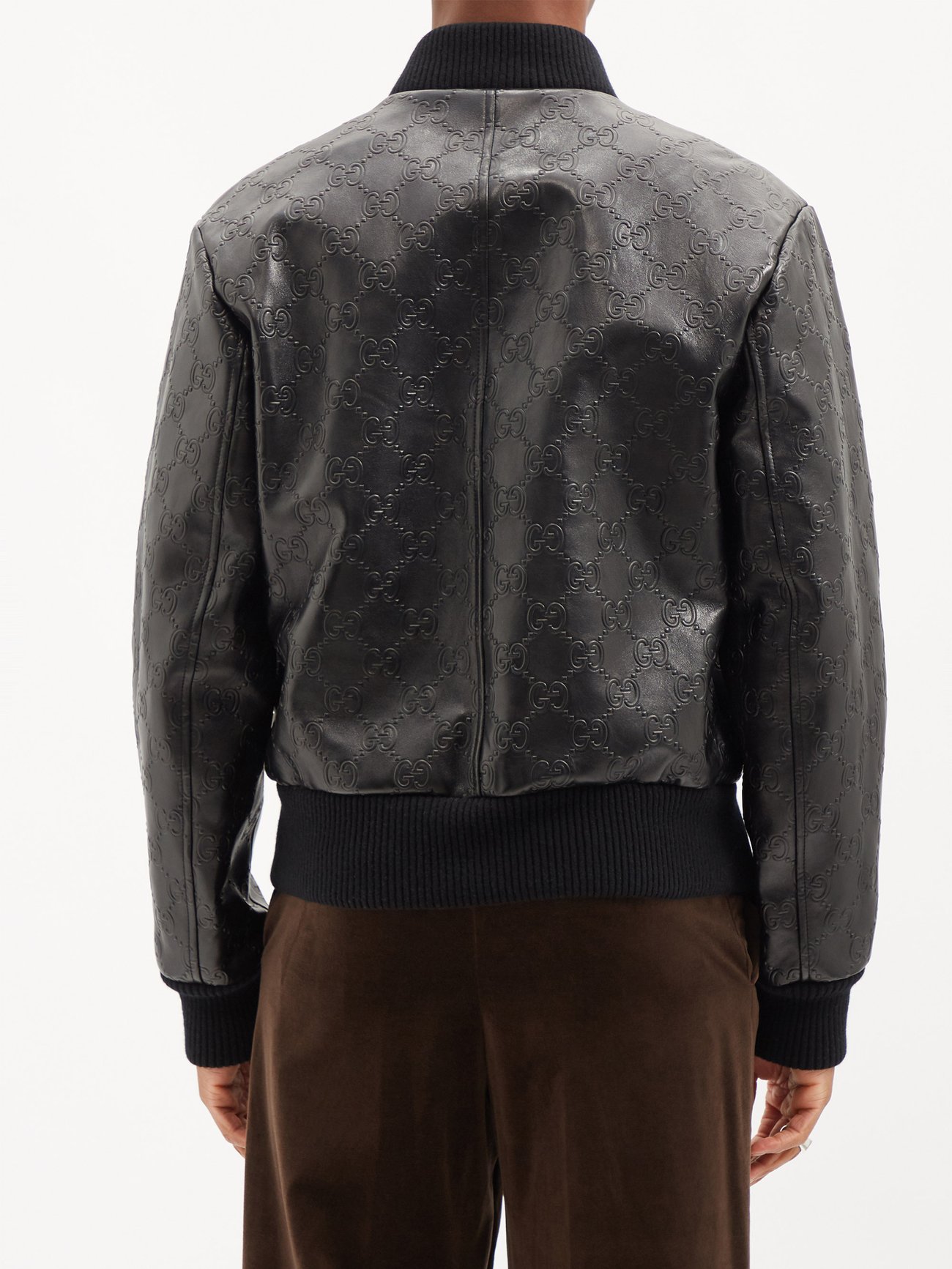 GG-embossed leather bomber jacket | Gucci