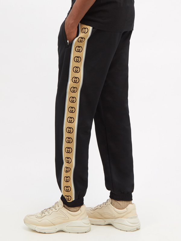 Interlocking G snap button jogging pant in olive green and ivory | GUCCI® US