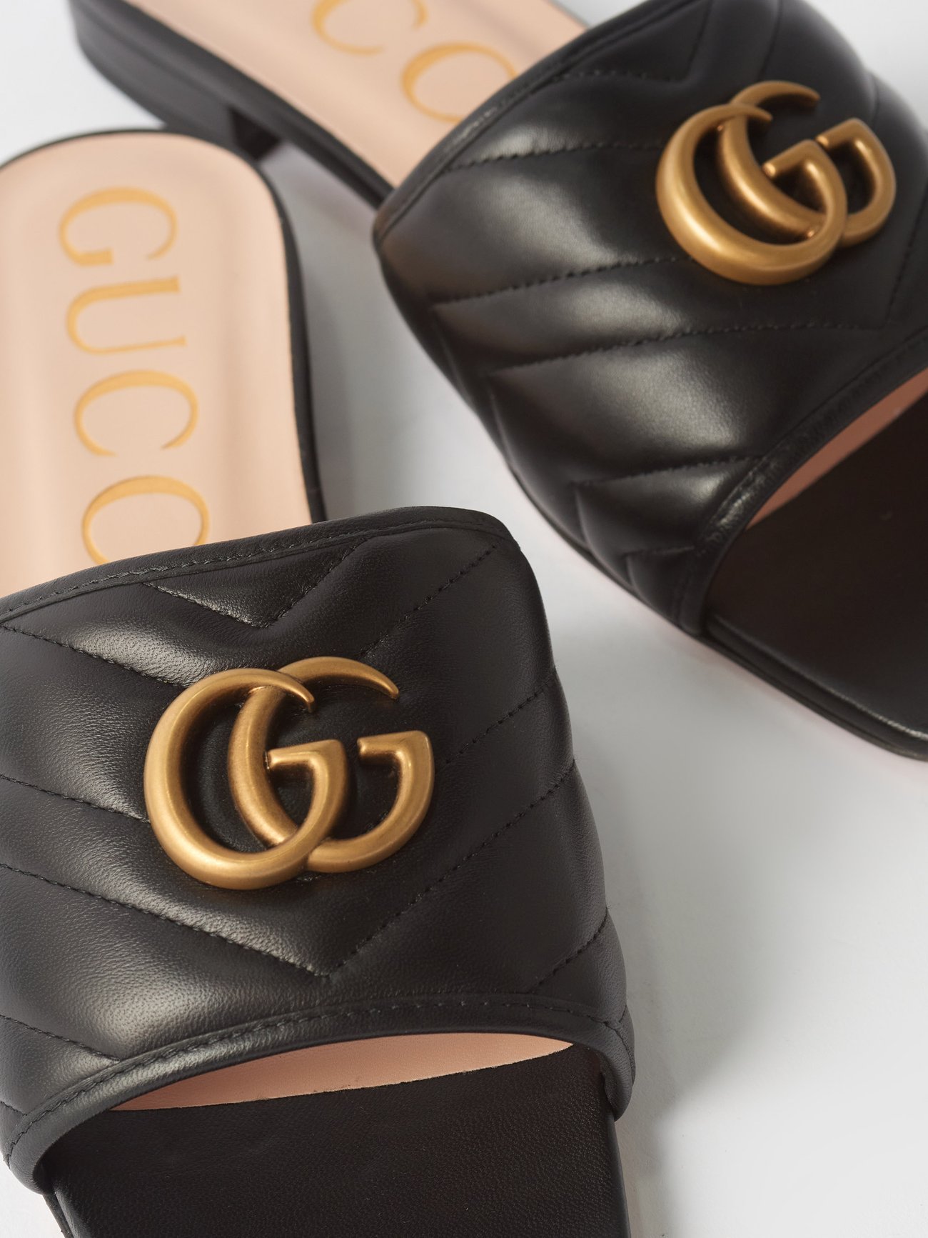 GG logo matelass leather slides