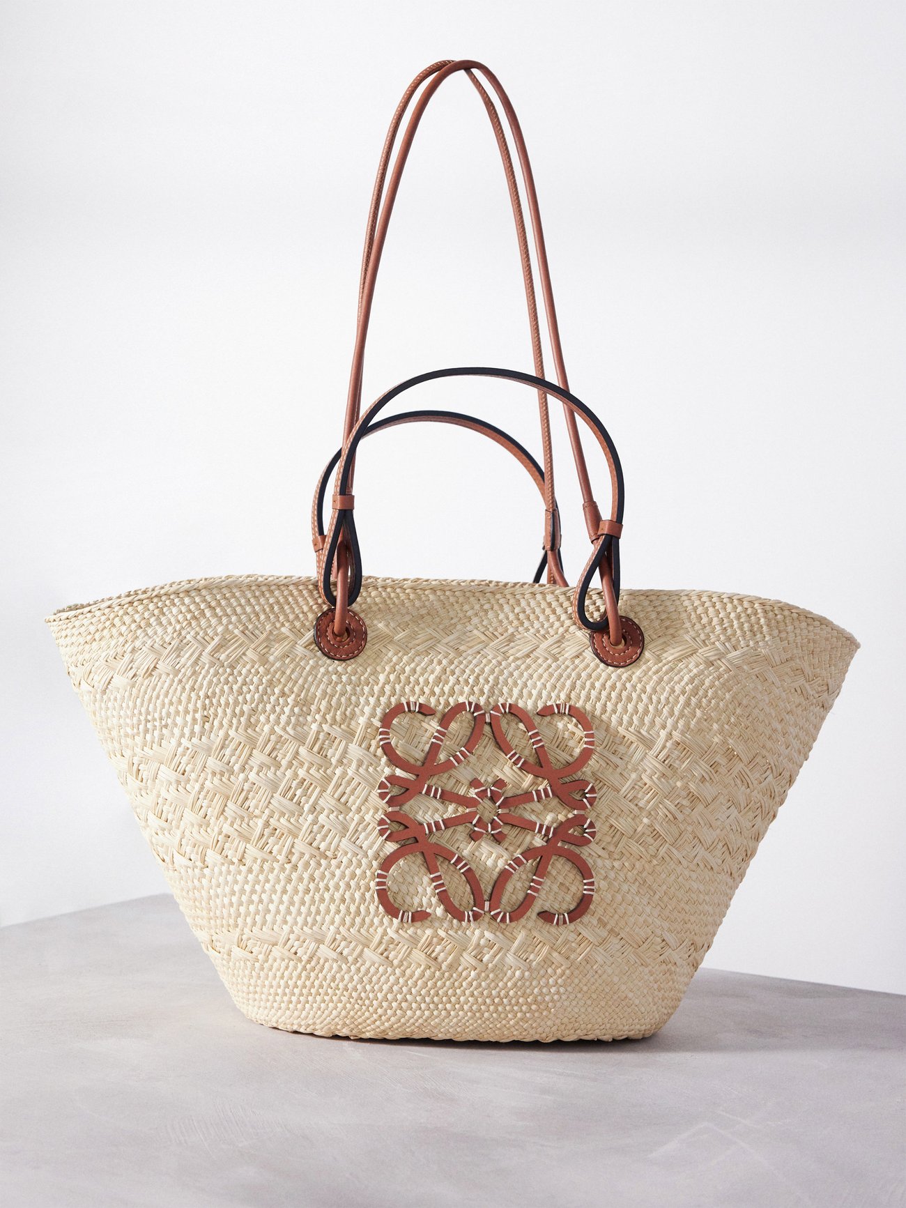 Beige Anagram-logo leather-trim woven basket bag | LOEWE | MATCHES UK