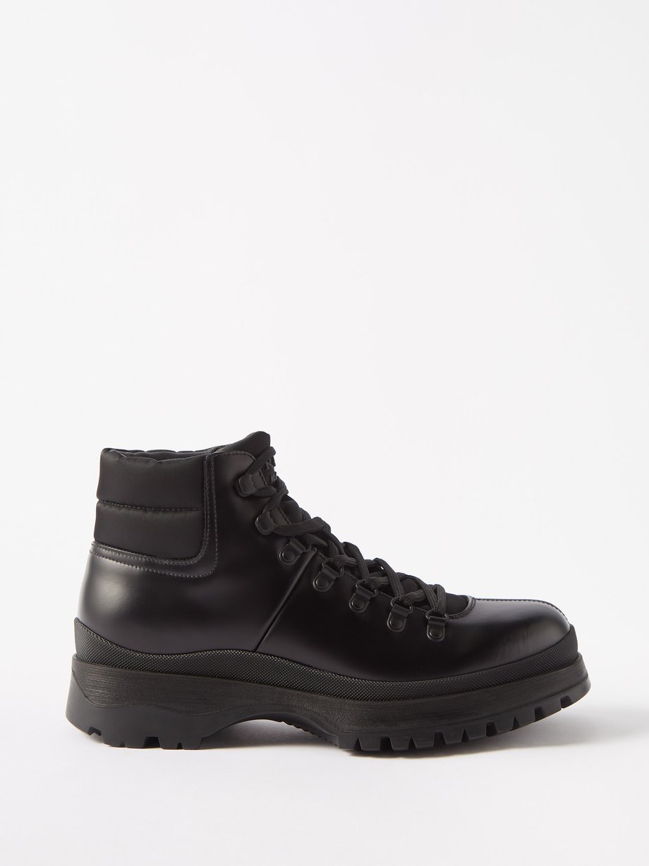Black Brixxen logo-embossed leather boots | Prada | MATCHESFASHION US