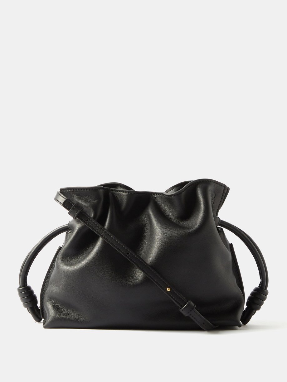 Black Flamenco mini leather clutch bag | LOEWE | MATCHES UK
