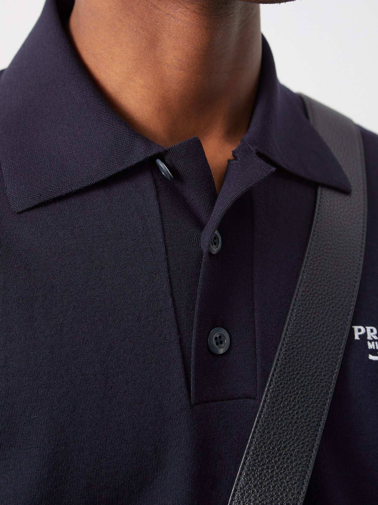 Oversized logo-embroidered wool-blend polo shirt