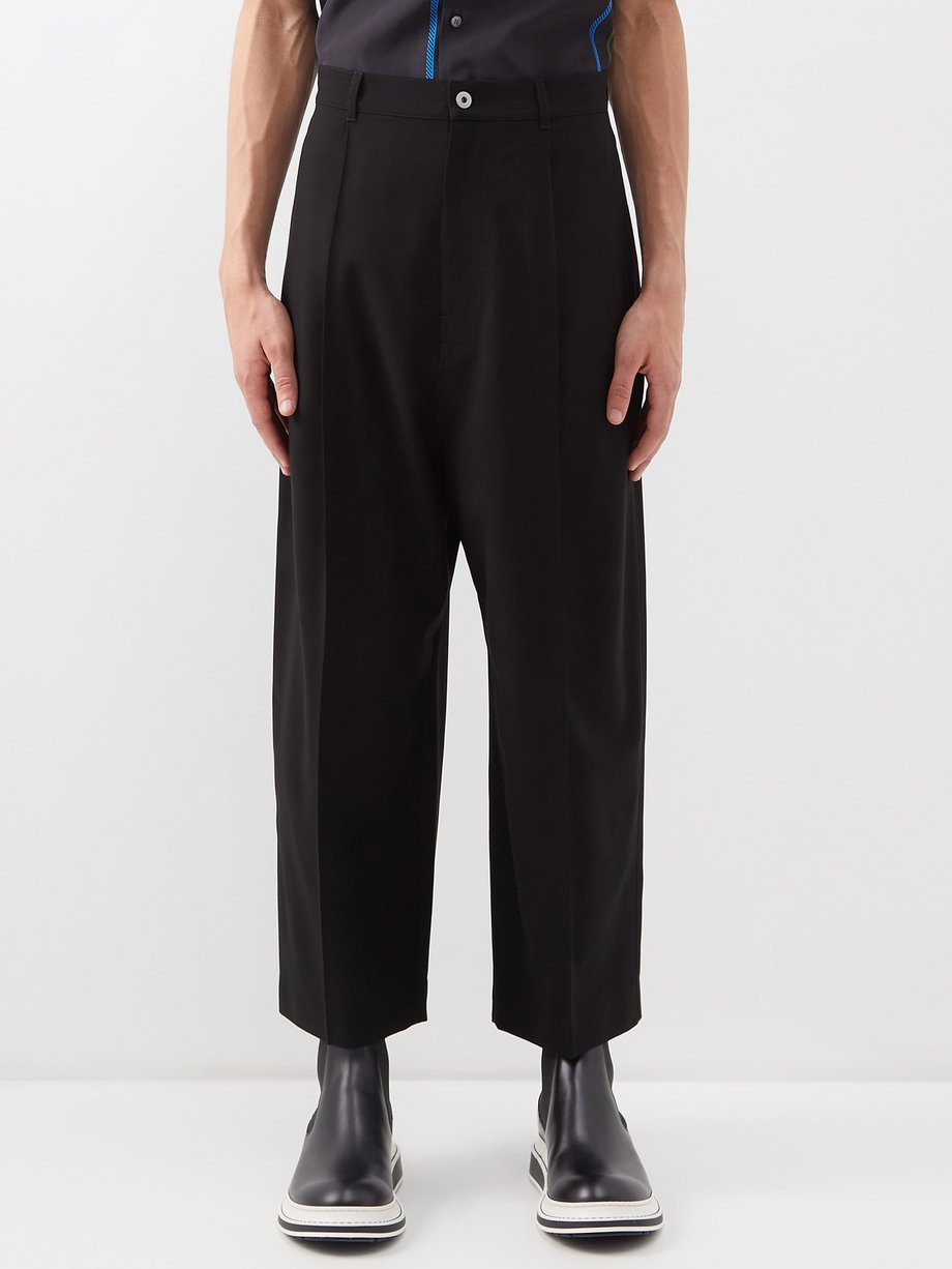Black Pleated wool wide-leg trousers | LOEWE | MATCHESFASHION UK