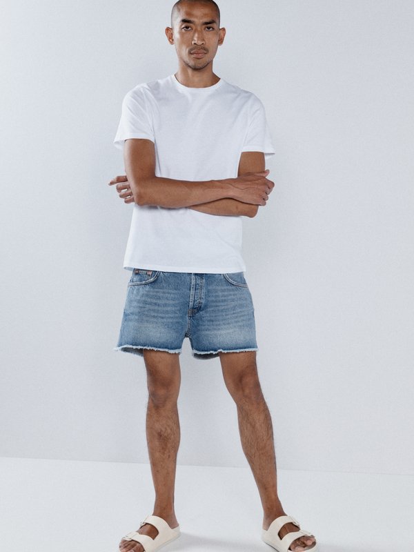 Raey Organic denim frayed hem shorts