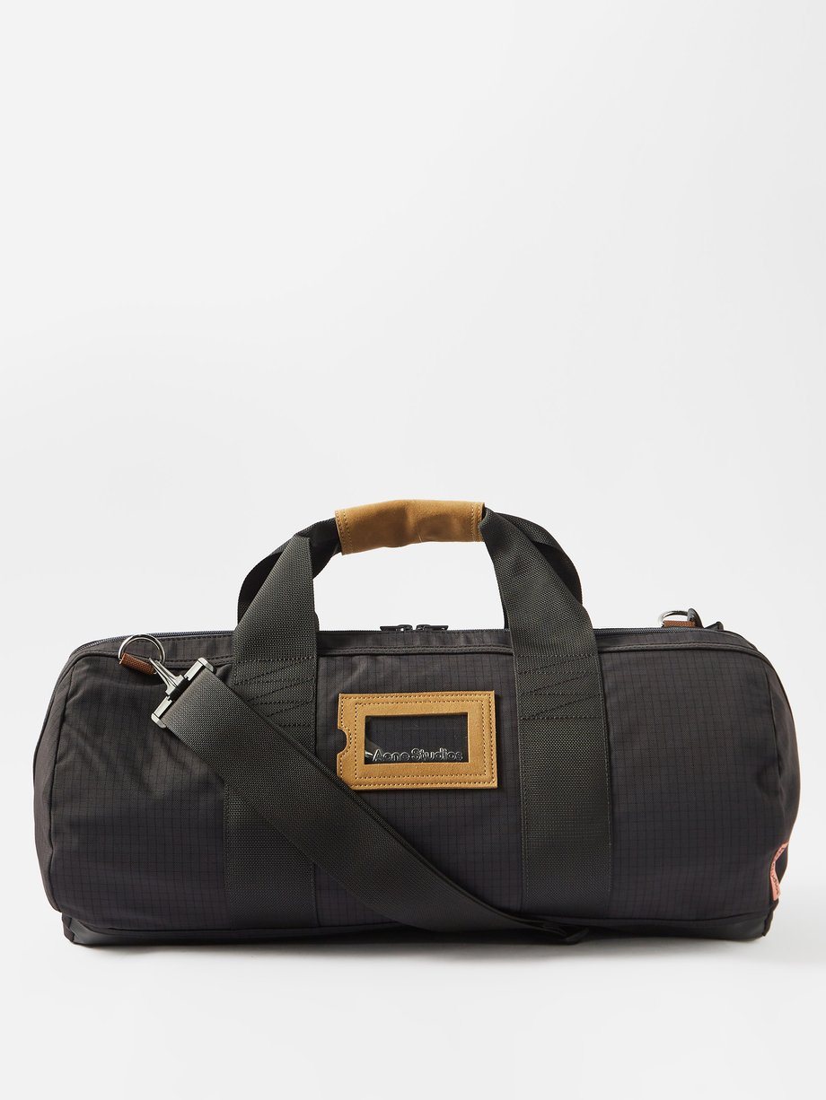 Intrekking snor groep Black Suede-trimmed ripstop duffel bag | Acne Studios | MATCHESFASHION US