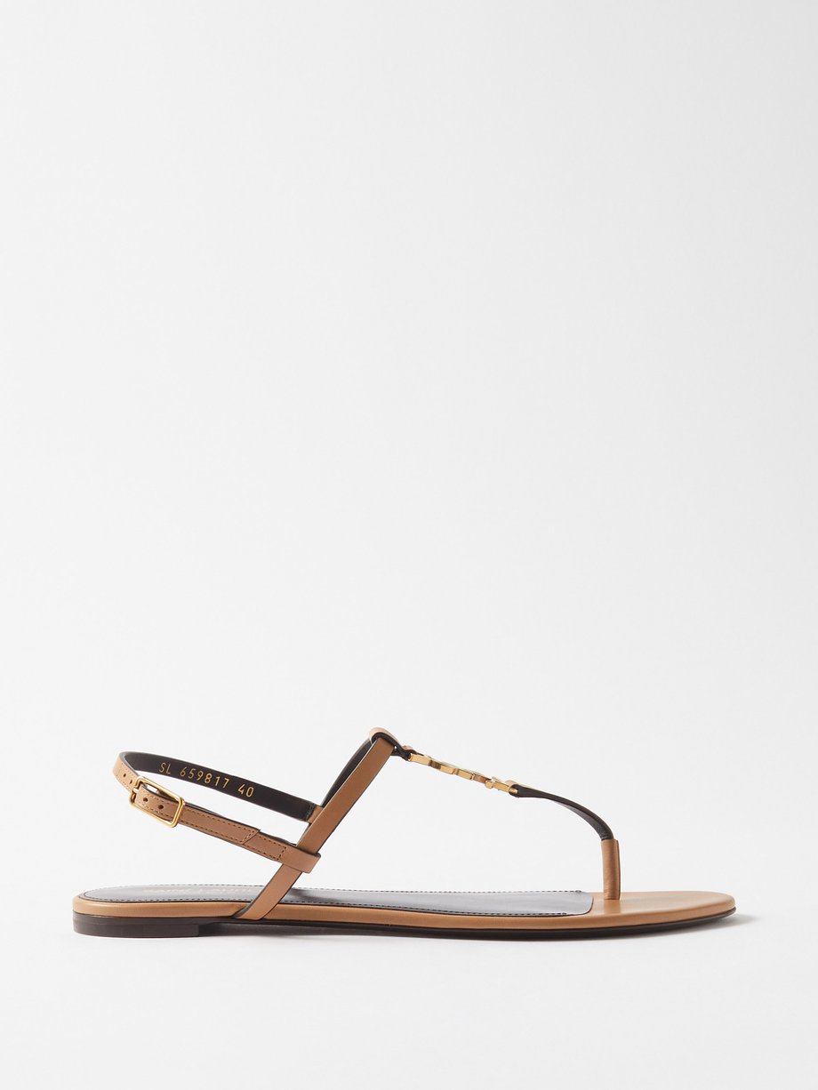 Gold Cassandra YSL leather flat sandals | Saint Laurent | MATCHESFASHION UK