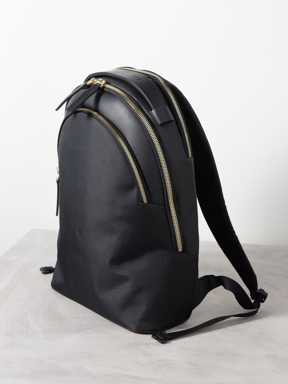 Black Momentum triple-zip canvas backpack | Troubadour | MATCHES UK