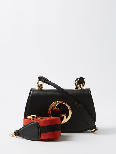 Gucci black handbag with on sale stripe