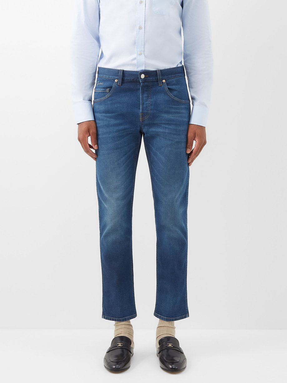 Blue multi GG-logo straight-leg jeans | Gucci | MATCHESFASHION UK