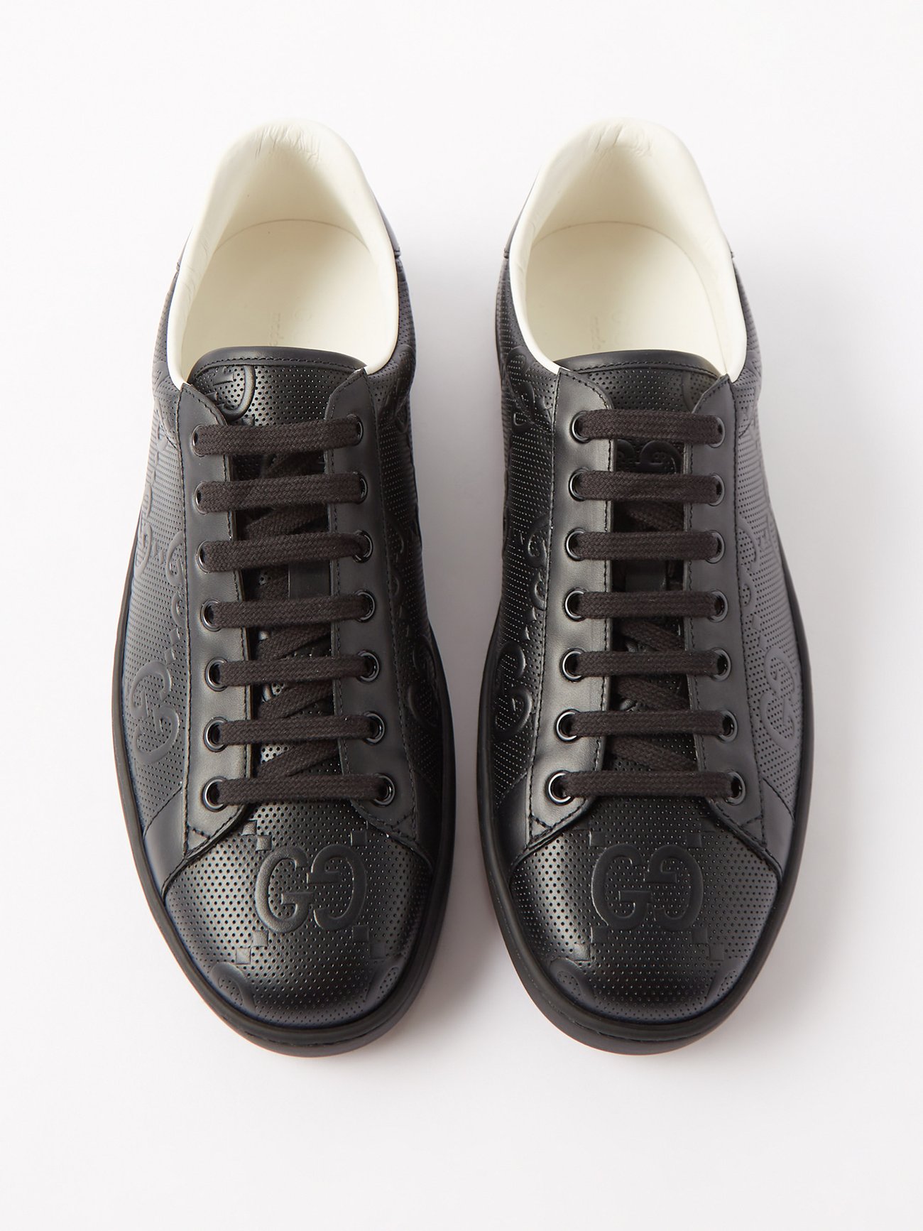 Men's Ace GG embossed sneaker in black leather