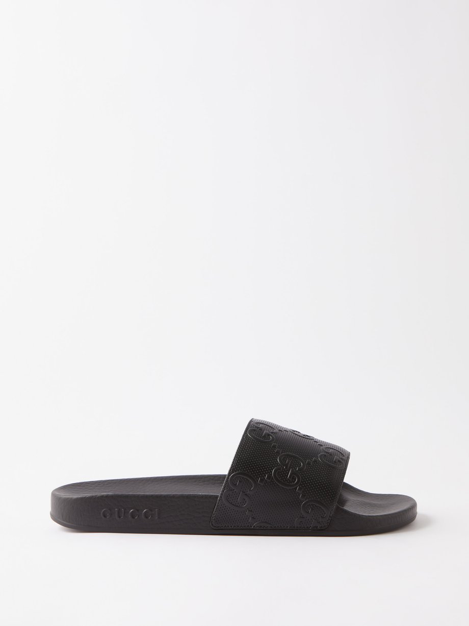 Black GG-embossed rubber slides | Gucci | MATCHESFASHION US