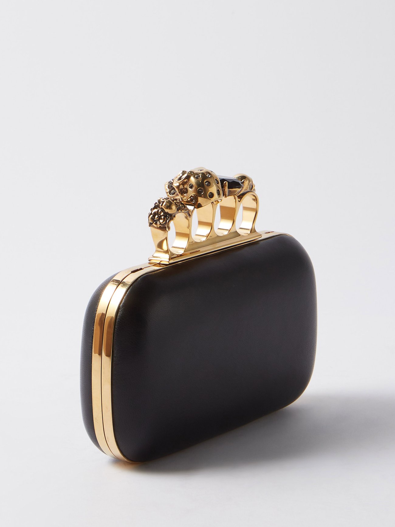 Black Skull Four Ring leather clutch bag, Alexander McQueen