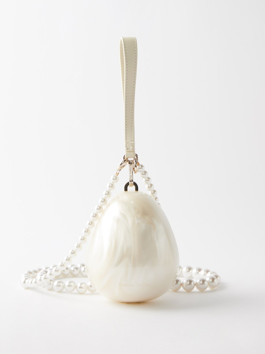 Micro Egg pearl-embellished clutch in white - Simone Rocha