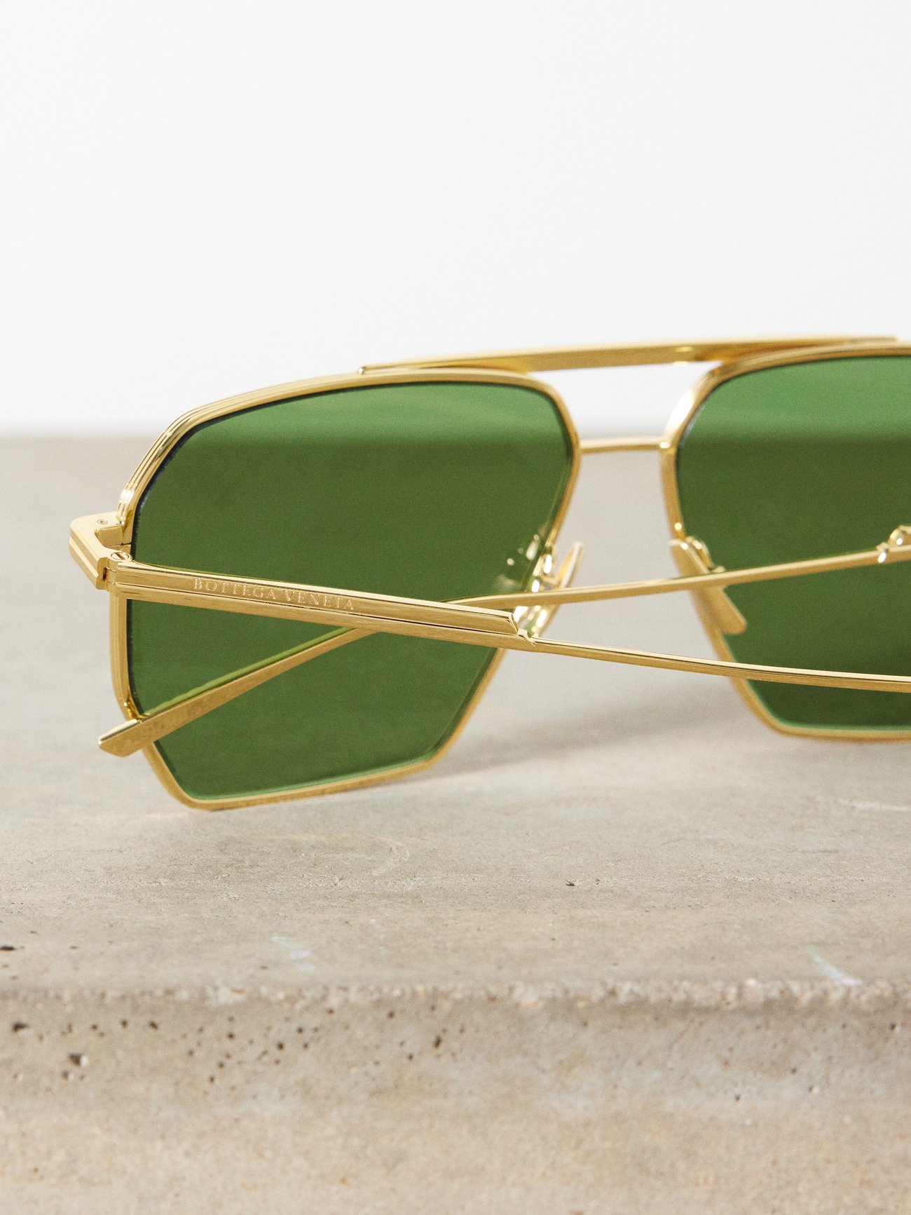 Gold Aviator metal sunglasses | Bottega Veneta | MATCHES UK