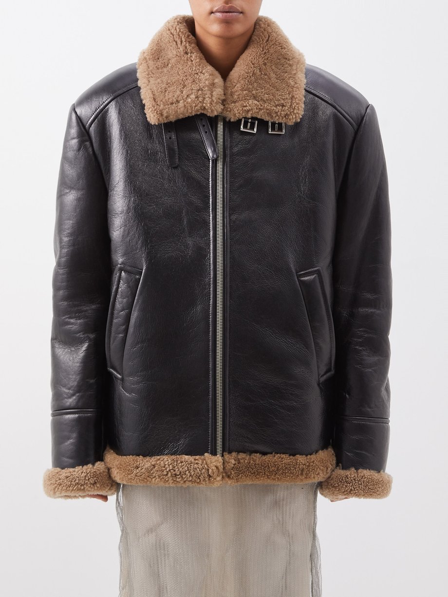 Black Oversized shearling coat | Prada | MATCHESFASHION UK