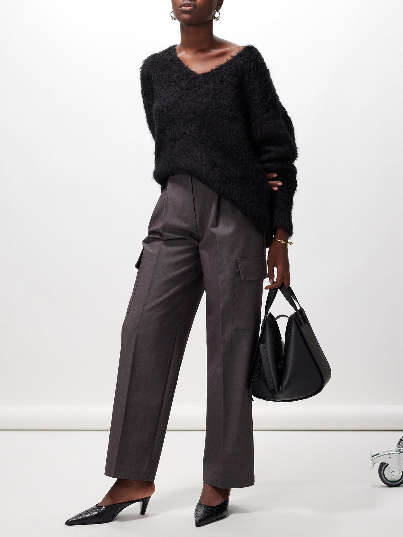 The Frankie Shop imparts a fluidity to these grey cargo trousers, cut to a high waist and wide leg from technical cloth that falls in a flattering relaxed drape.