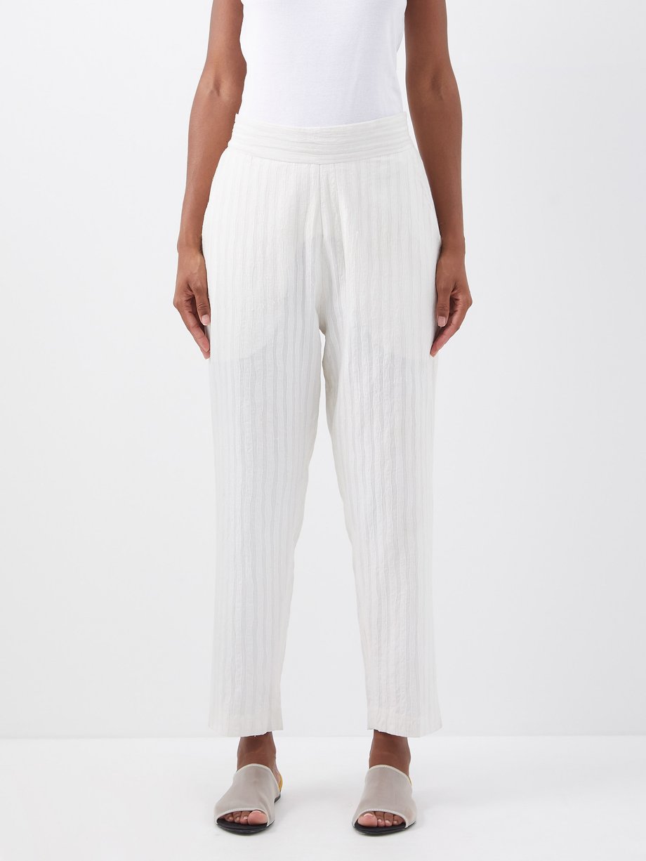 White Cyrus embroidered cotton trousers | Delos | MATCHESFASHION UK