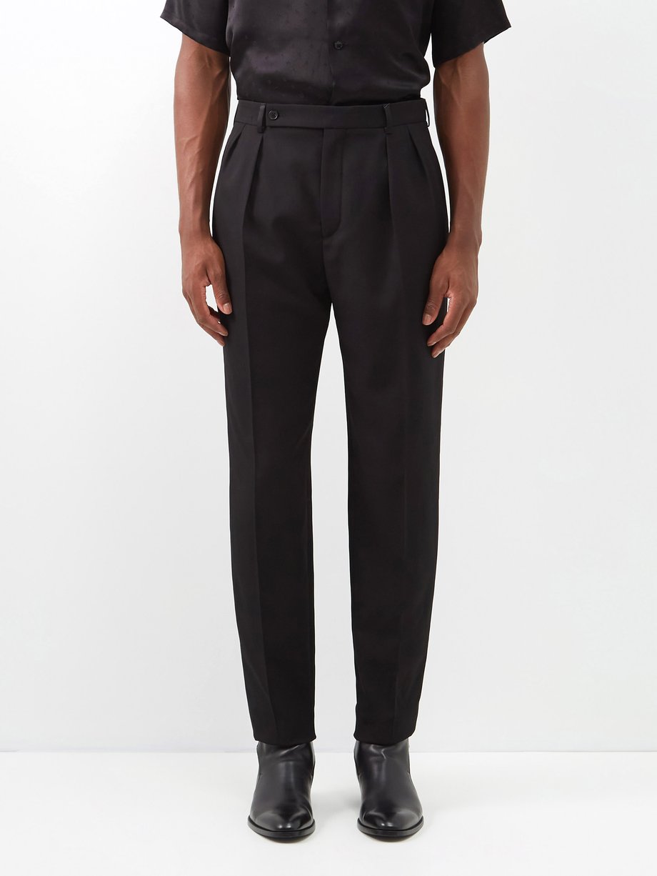 Black Pleated wool-twill carrot-leg trousers | Saint Laurent ...