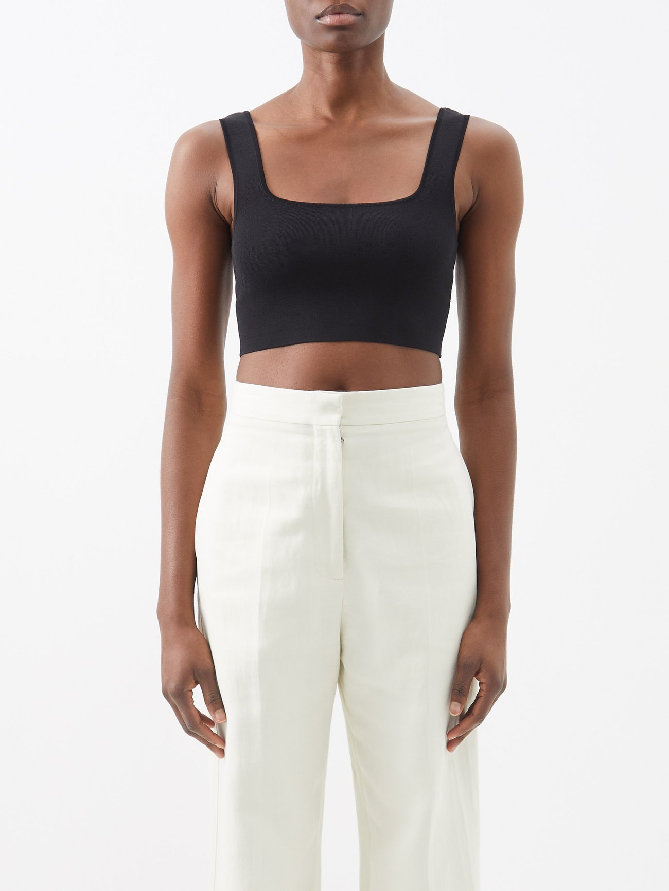 Drawing inspiration from 1990s minimalism, Matteau’s black The Nineties crop top has a flattering square neck.