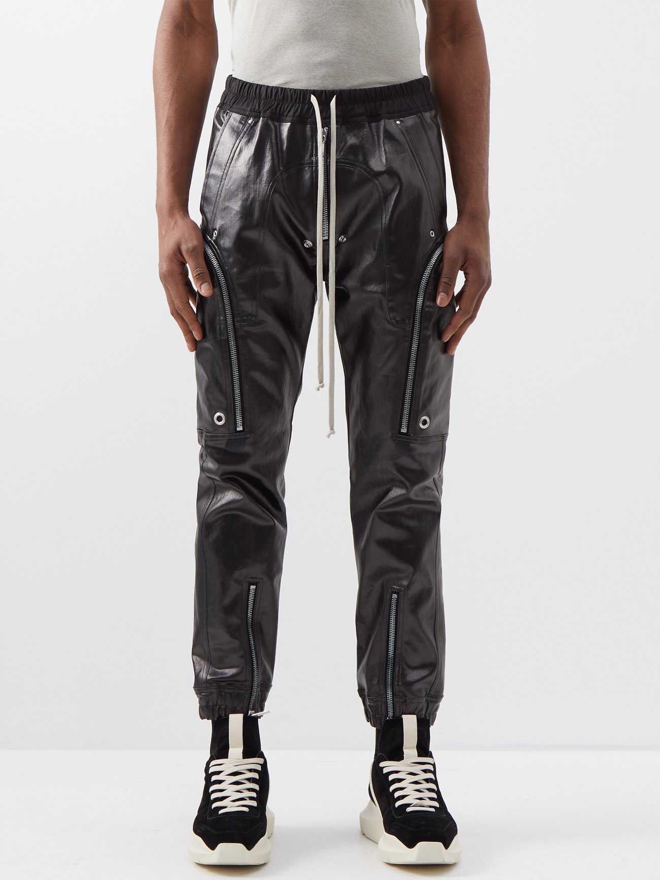 Black Bauhaus lacquered stretch-denim track pants | Rick Owens