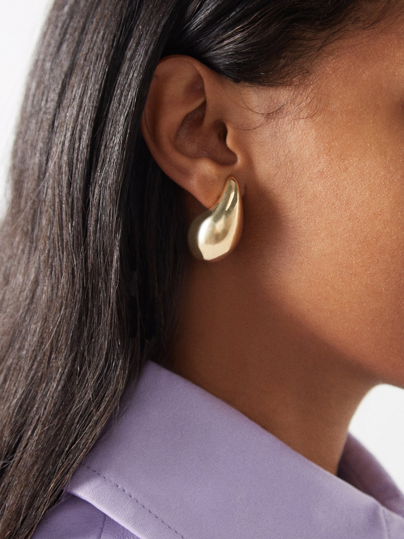 Bottega Veneta gold coloured drop earrings. Smooth, rendered edges and a bulbous profile lend an artistic nuance to Bottega Veneta's gold-plated sterling silver Drop earrings.