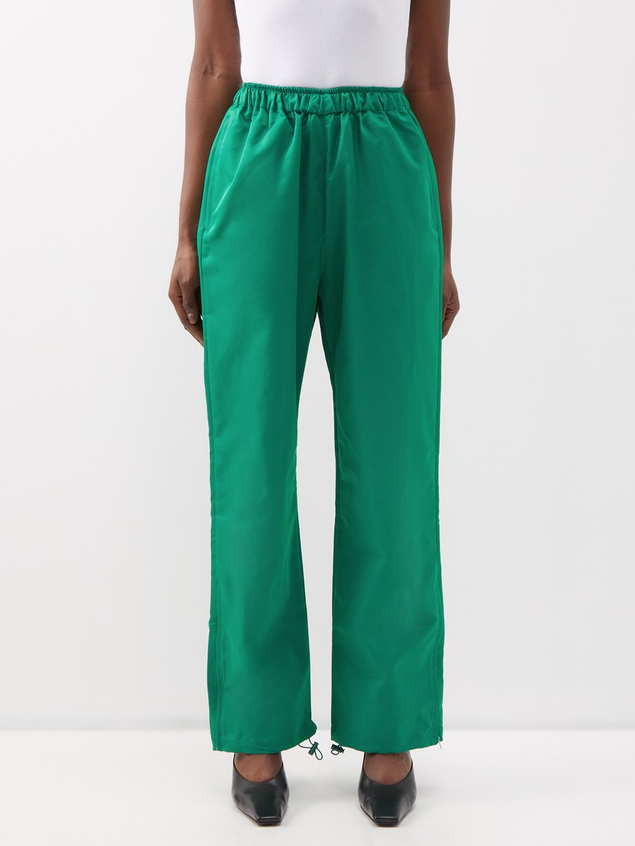 Green Kevin zip-cuff technical track pants | The Frankie Shop | MATCHES UK