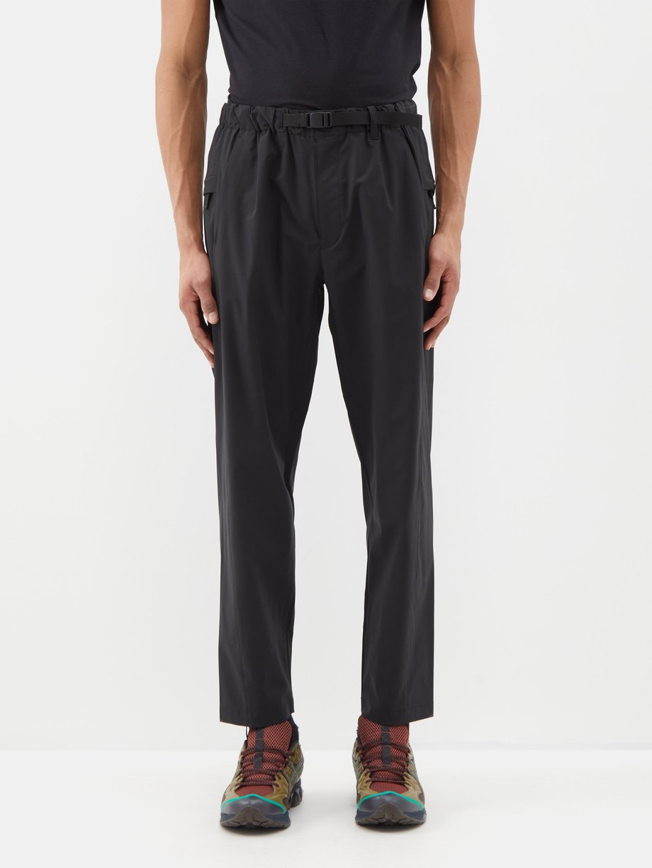 Black All Direction stretch-shell tapered trousers | GOLDWIN ...